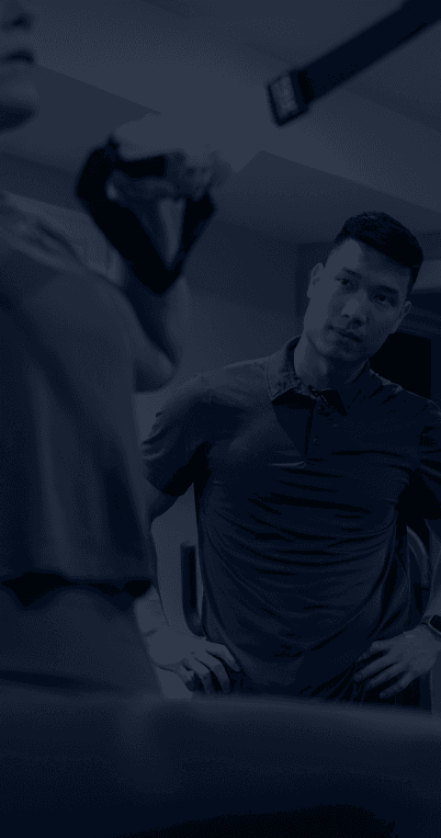 An image of Dinh training a client.