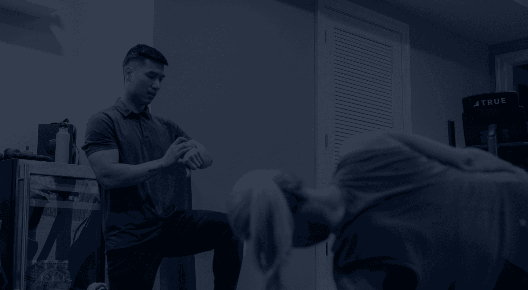 An image of Dinh training a client.
