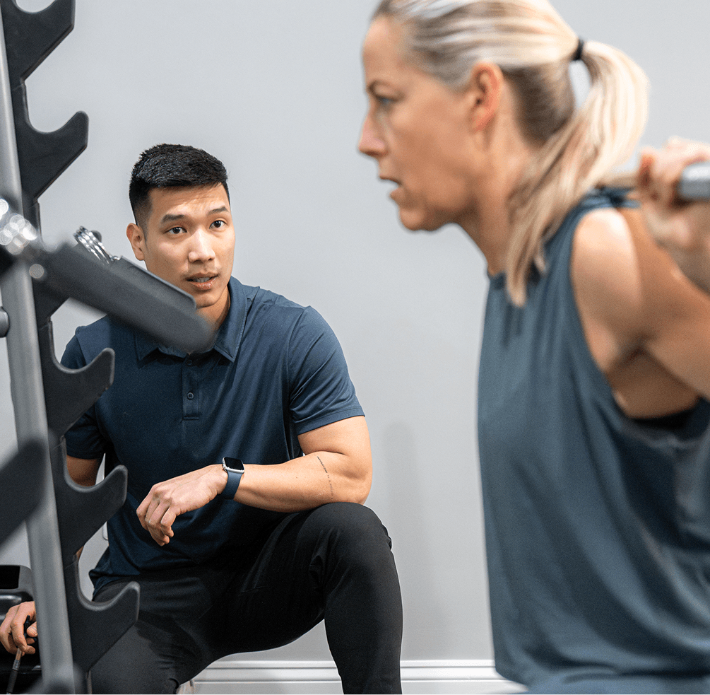 An image of Dinh training a client.
