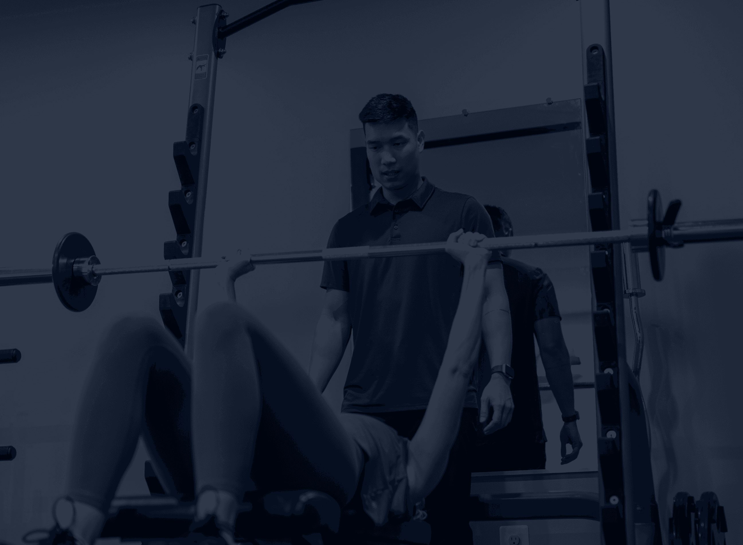 An image of Dinh training a client.